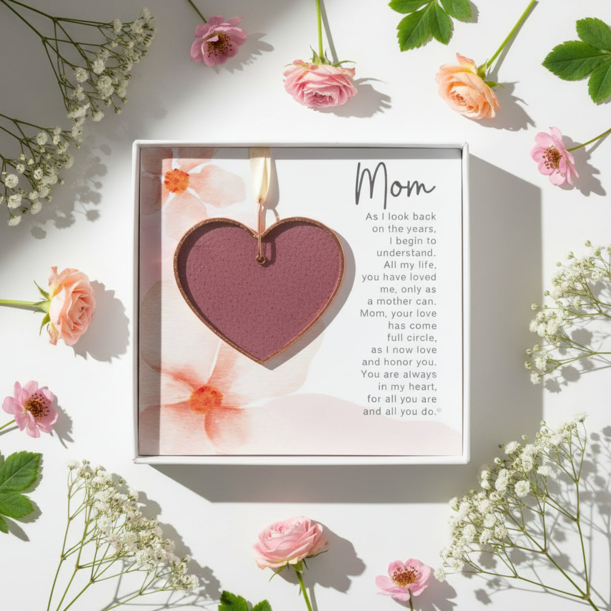 Mom artwork with poem and pink stained glass heart with flowers around the box.