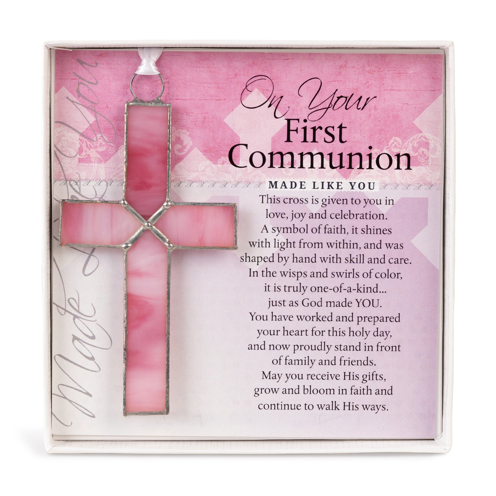 First Communion Gift - 4 1/4" pink stained glass cross and "On Your First Communion" sentiment in white box with clear lid.