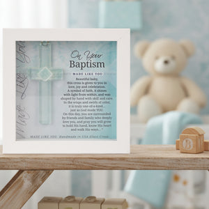 2 of 4:Baptism gift on a shelf in a baby's room.