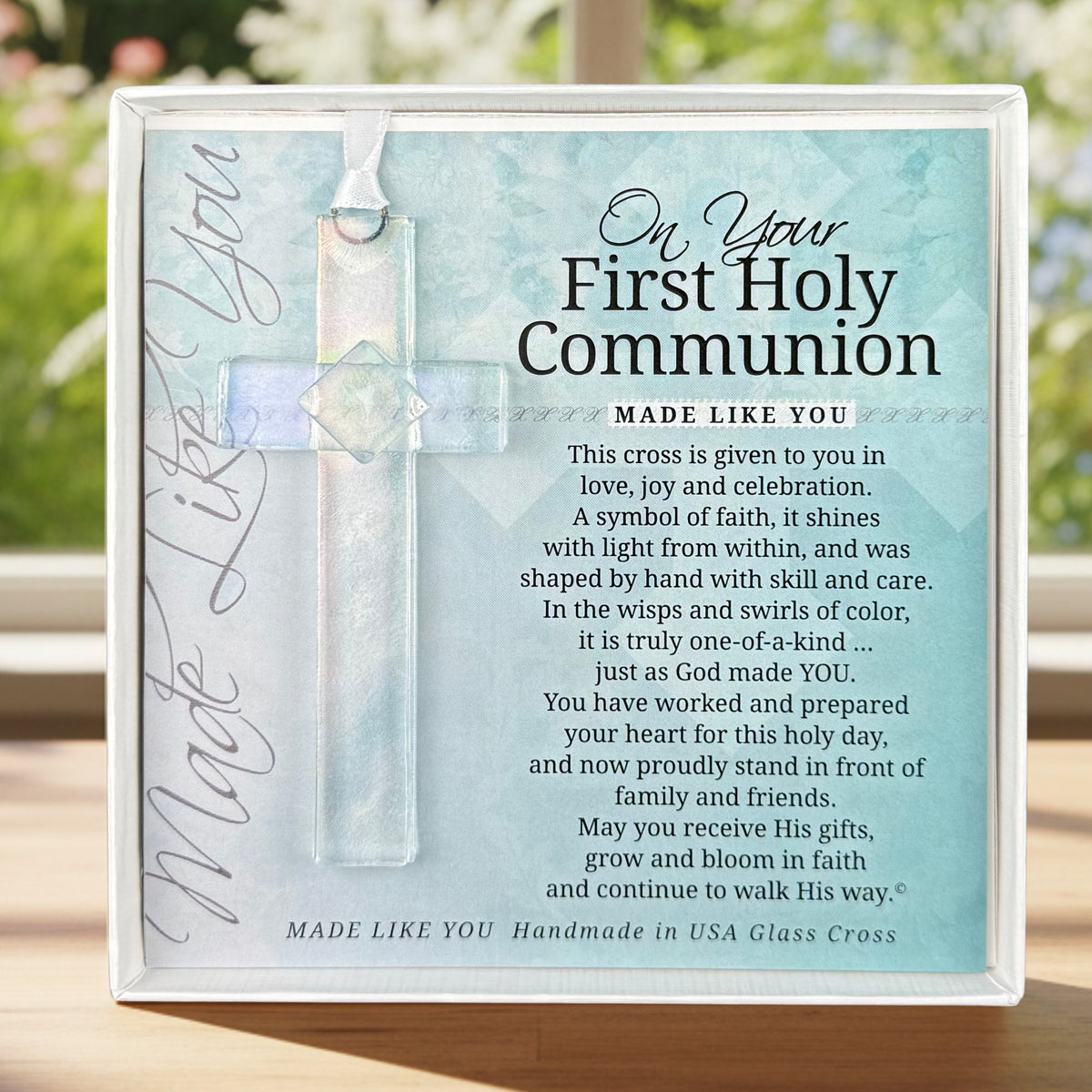 First Communion Gift - Handmade 4" clear iridescent glass cross and "On Your First Holy Communion" sentiment in white box with clear lid.