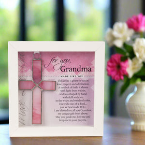 2 of 4:Grandma gift sitting on a table with flowers. 