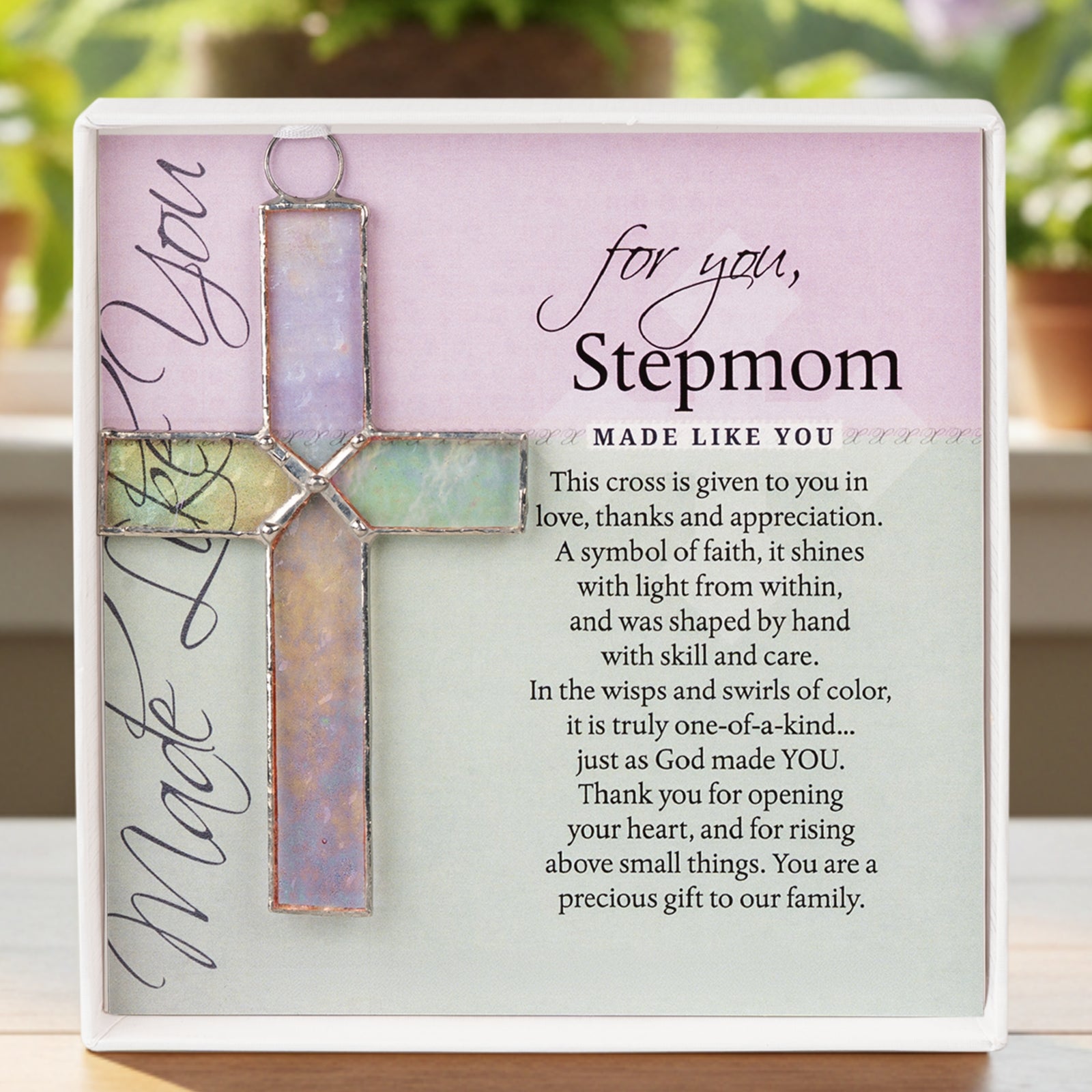For You Stepmom: Handmade clear stained glass cross with sentiment; packaged in a white 5.5"x5.5" box with a clear lid.