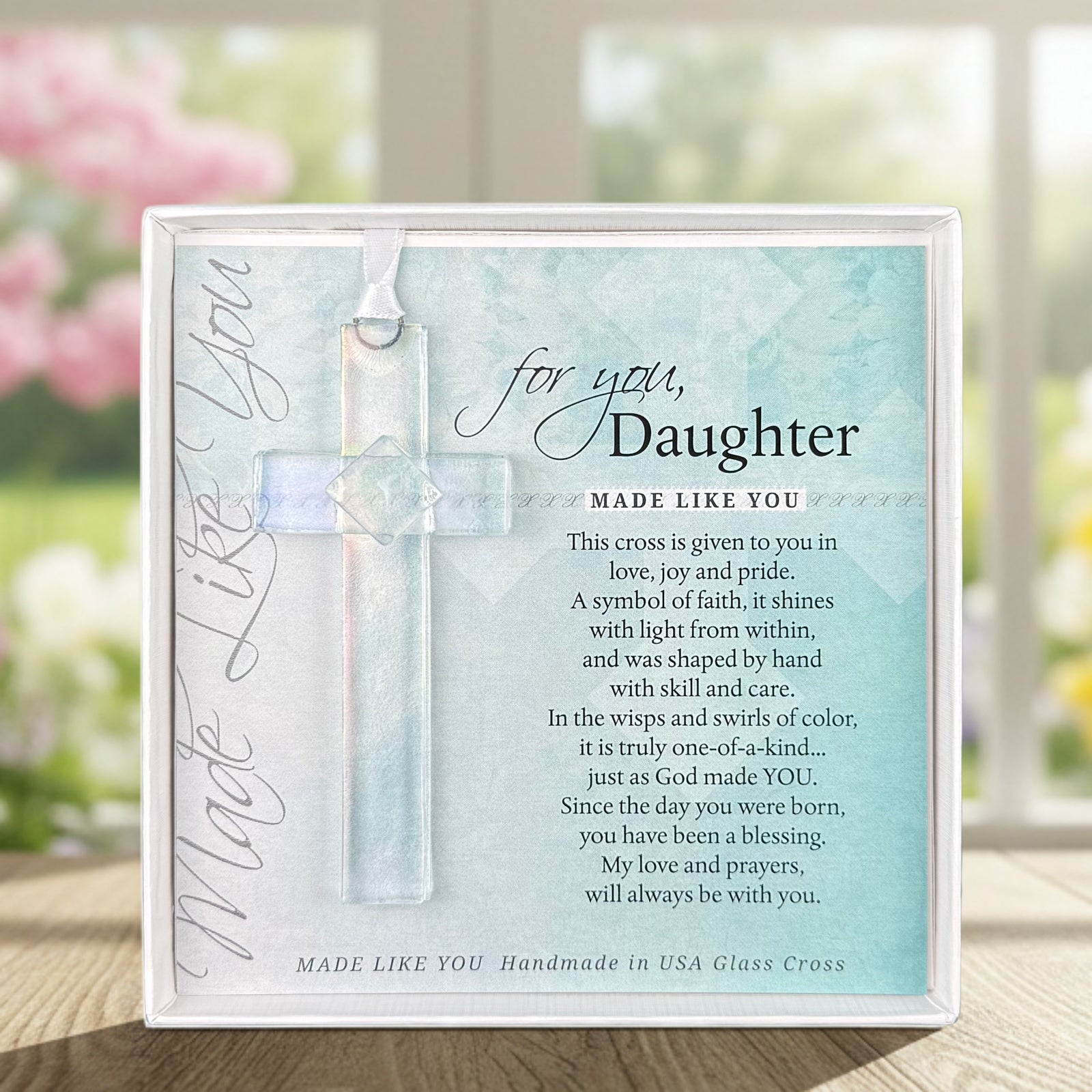 For You Daughter: Handmade clear glass cross with sentiment; packaged in a white 5.5"x5.5" box with a clear lid.