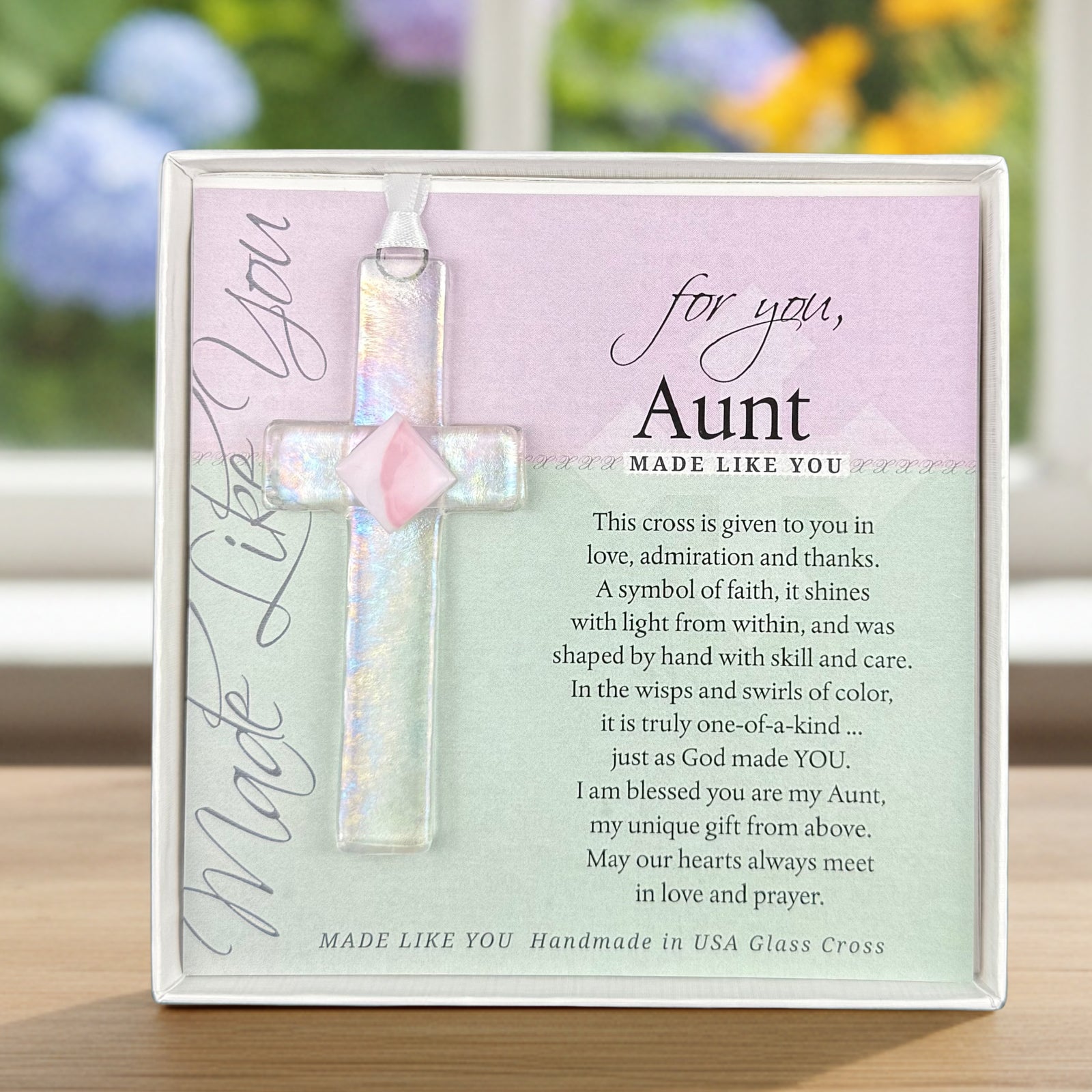 For You Aunt: Handmade clear glass cross with pink accent and sentiment; packaged in a white 5.5"x5.5" box with a clear lid.