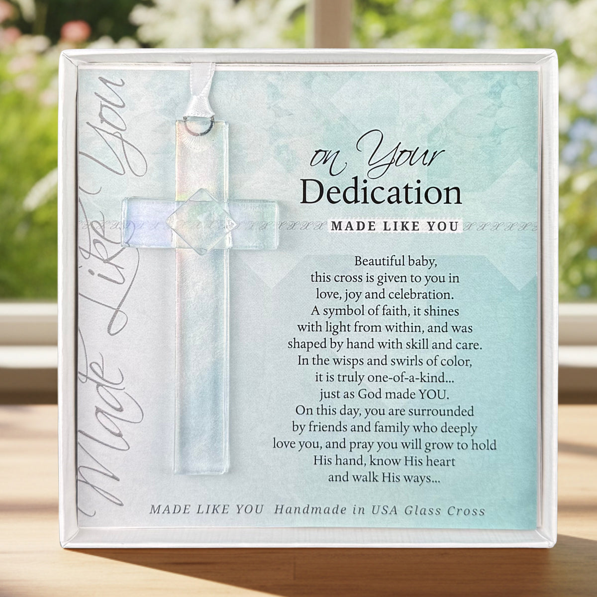 4" handmade clear iridescent hanging glass cross with "On Your Dedication" poem printed on cardstock in white gift box with clear lid.