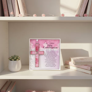 3 of 4:First Communion gift displayed on a girl's bookshelf.