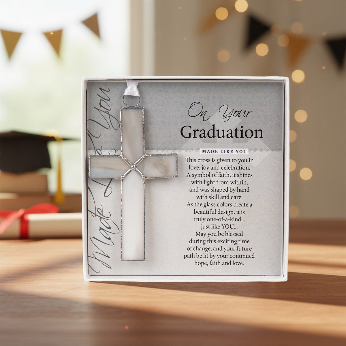 Graduation gift displayed on a table with party decorations.