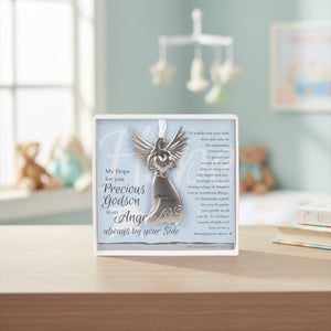 3 of 4:Precious Godson Gift sitting on a shelf in a nursery.