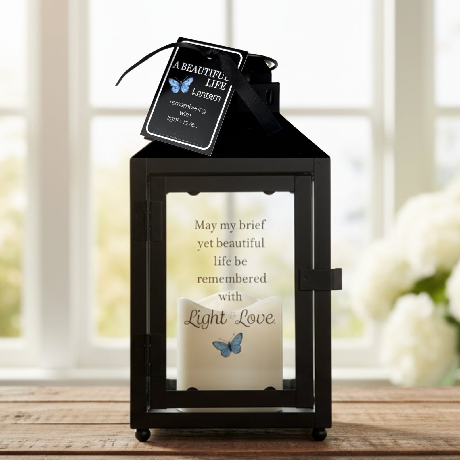 A Beautiful Life black metal lantern with flickering built in candle, printed sentiment on glass panel and gift tag.