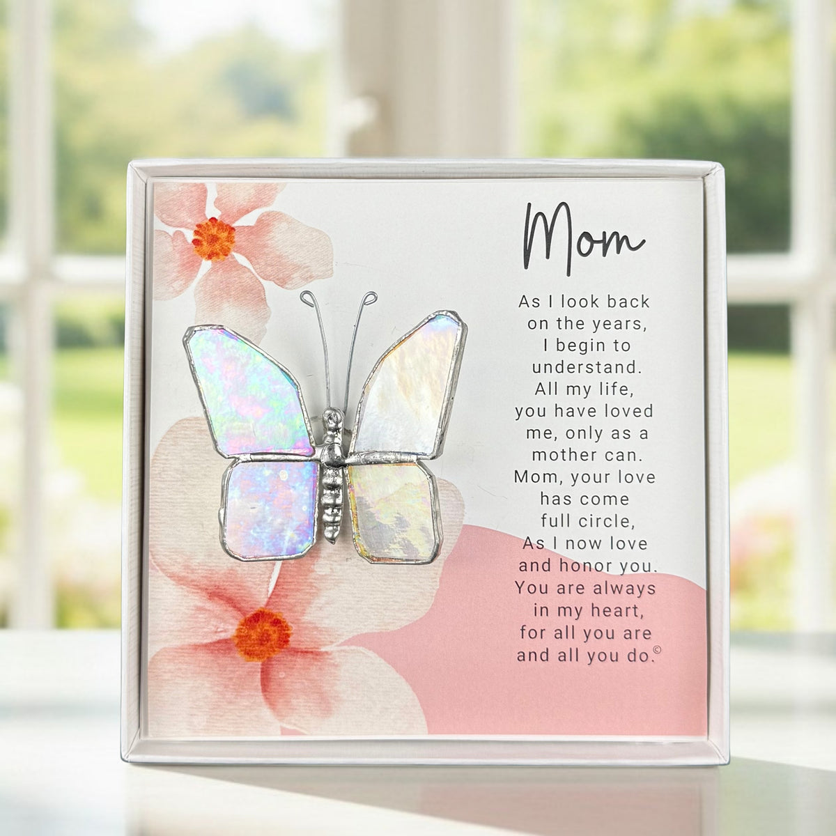 Stained glass butterfly packaged with "Mom" Poem in a white box with a clear lid.