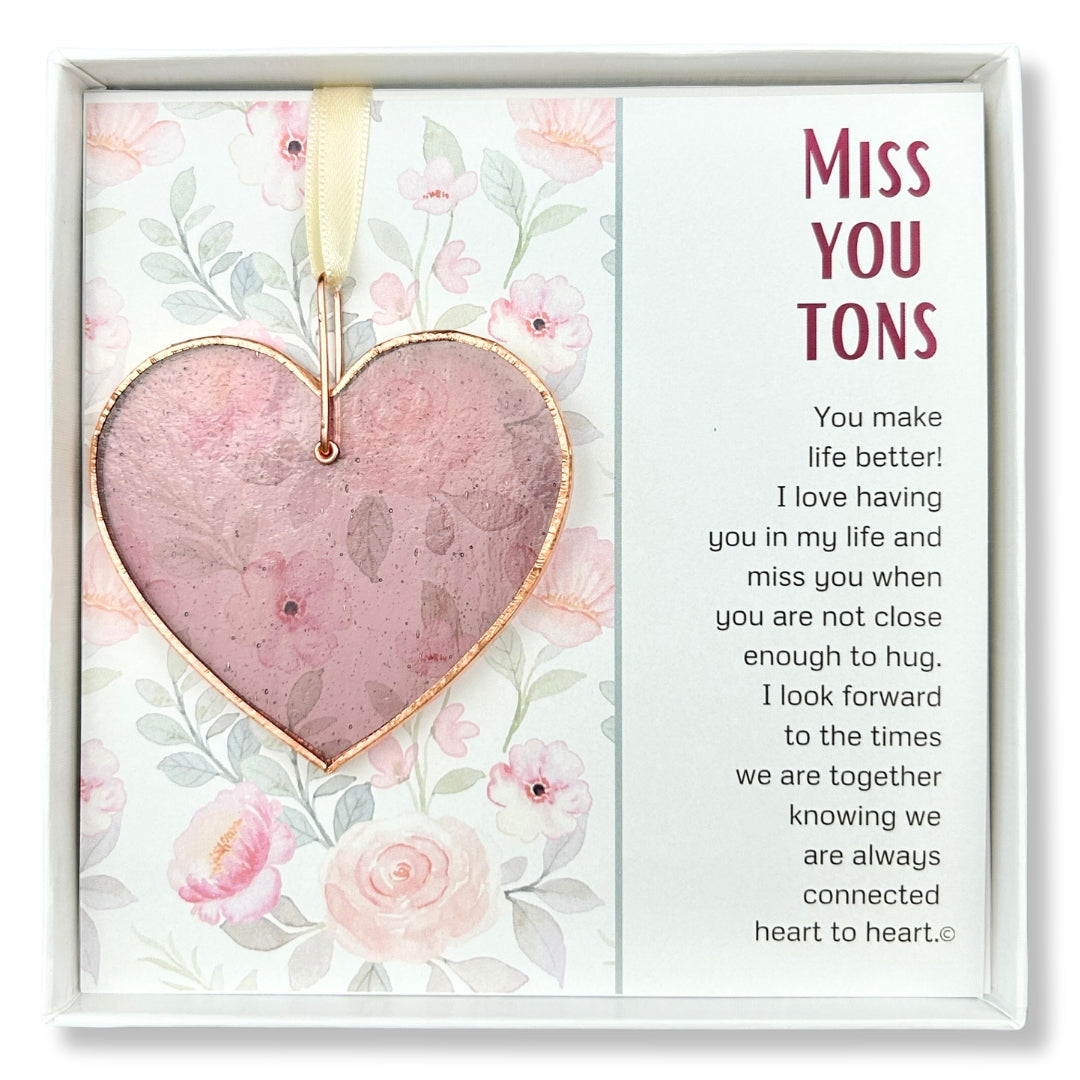 Rose Mauve stained glass heart packaged with &quot;Miss You Tons&quot; Poem in a white box with a clear lid.