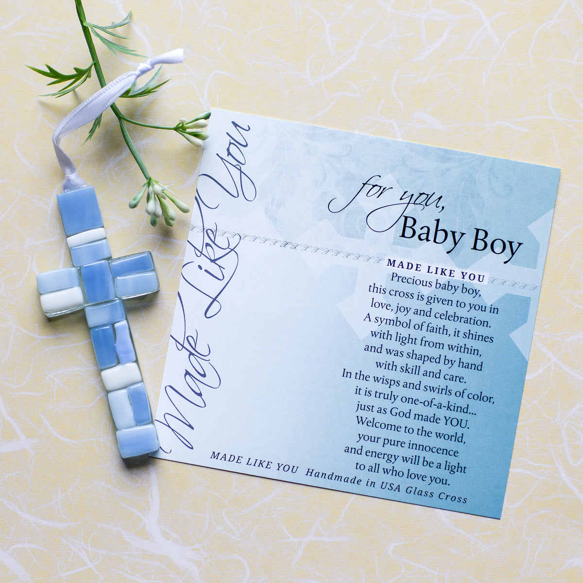 Blue Mosaic cross with shades of blue and white lying next to the For You, Baby Boy sentiment artwork.