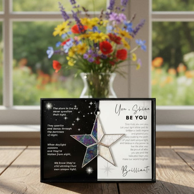 Handmade 4" clear iridescent stained glass star with silver edging, packaged with "You + Shines Be You" sentiment in black gift box with clear lid.