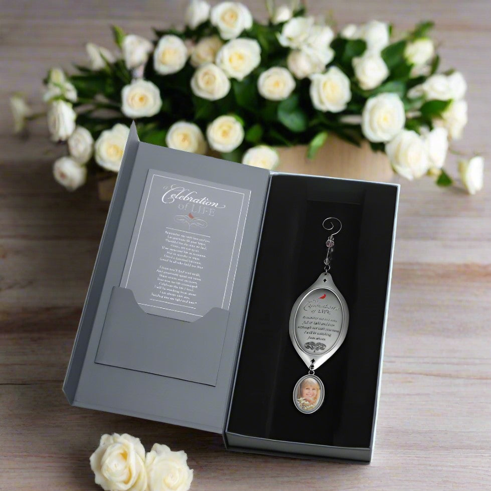 Celebration of Life ornament in it's box with the Celebration of Life poem card.