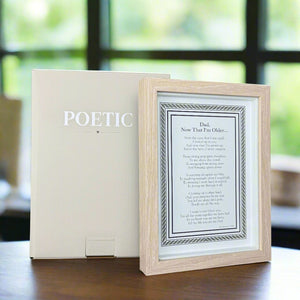 6 of 8:Framed poem next to its box with the text 'POETIC' on the box.