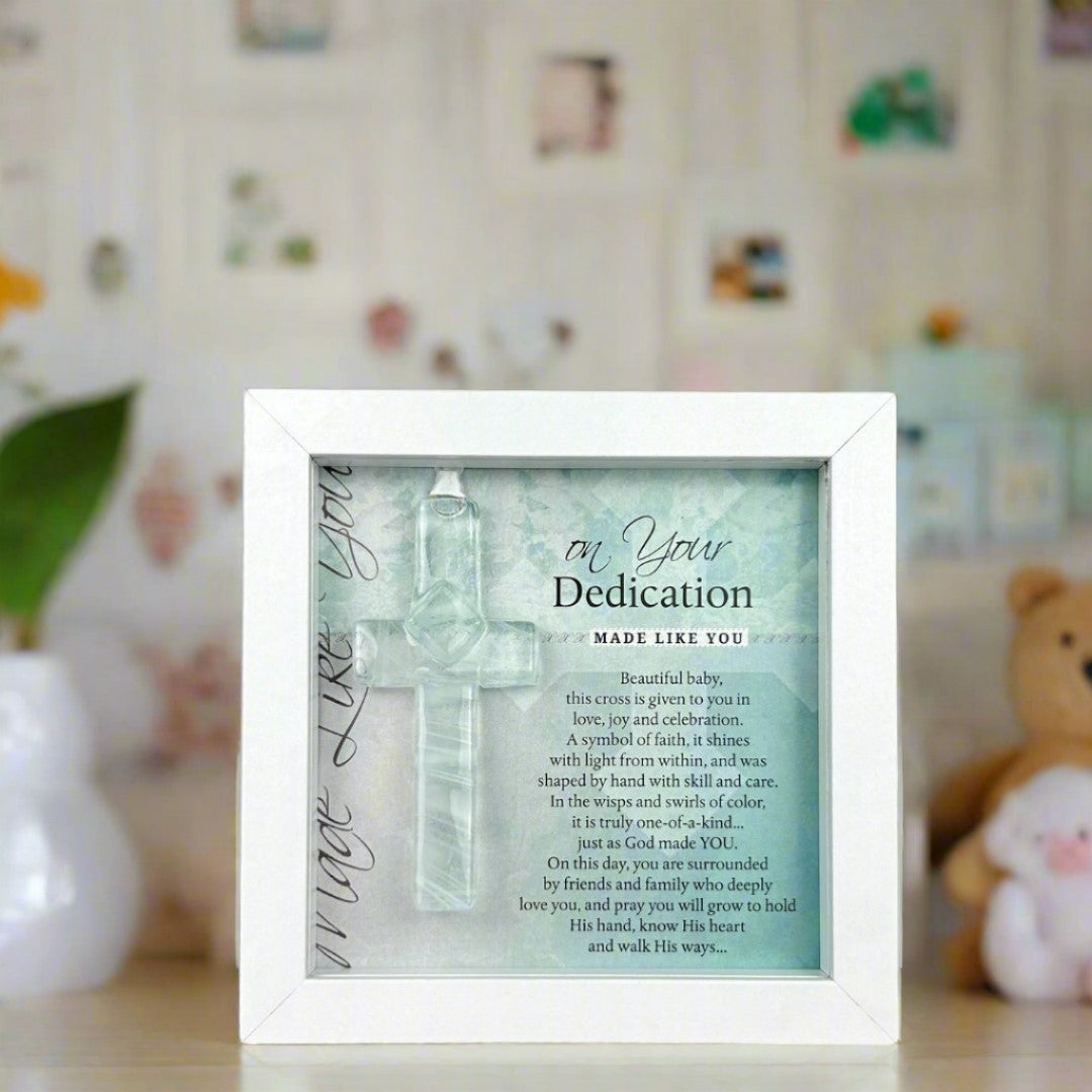 Framed Dedication Cross Gift in a nursery setting.