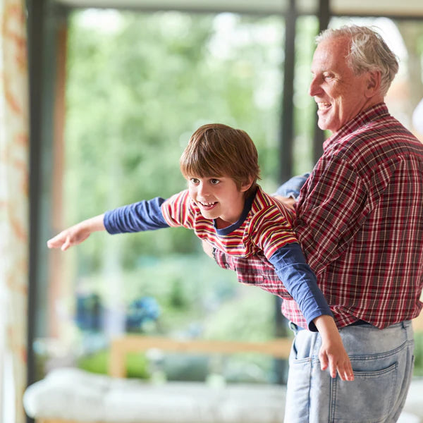 A grandpa playing with his grandson - Click to shop our Gifts for Grandpa
