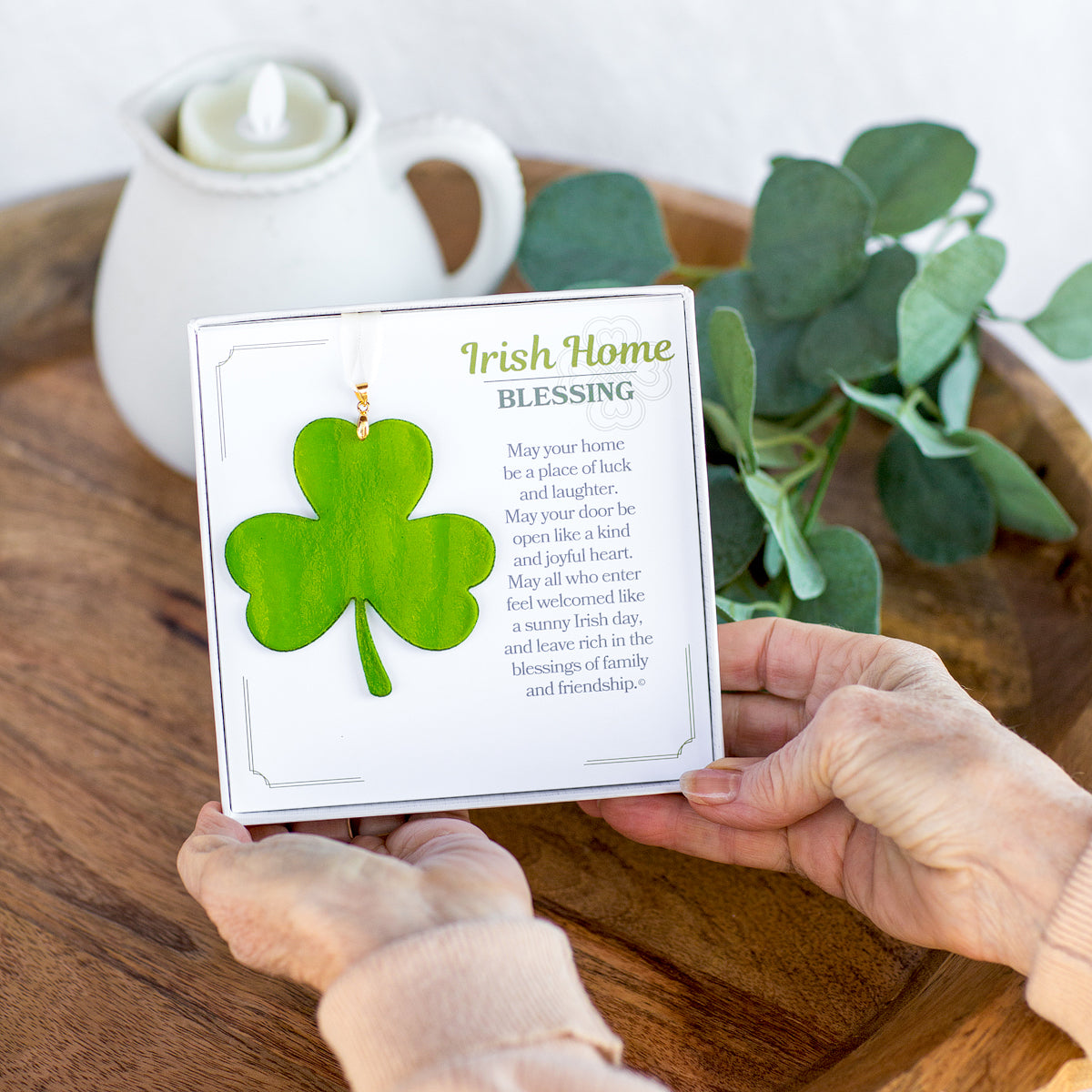 Irish Blessing Home gift being held in hands.