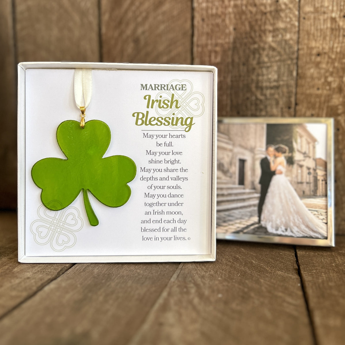 Marriage Irish Blessing Gift with wedding photo in background.