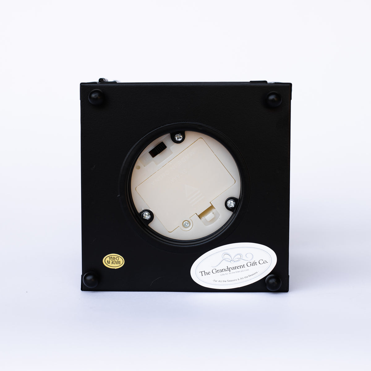 Bottom of lantern showing candle battery compartment and timer switch.