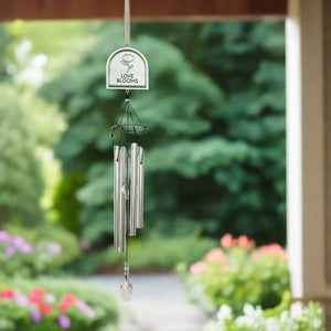 2 of 5:Love Blooms windchime hanging in a porch.