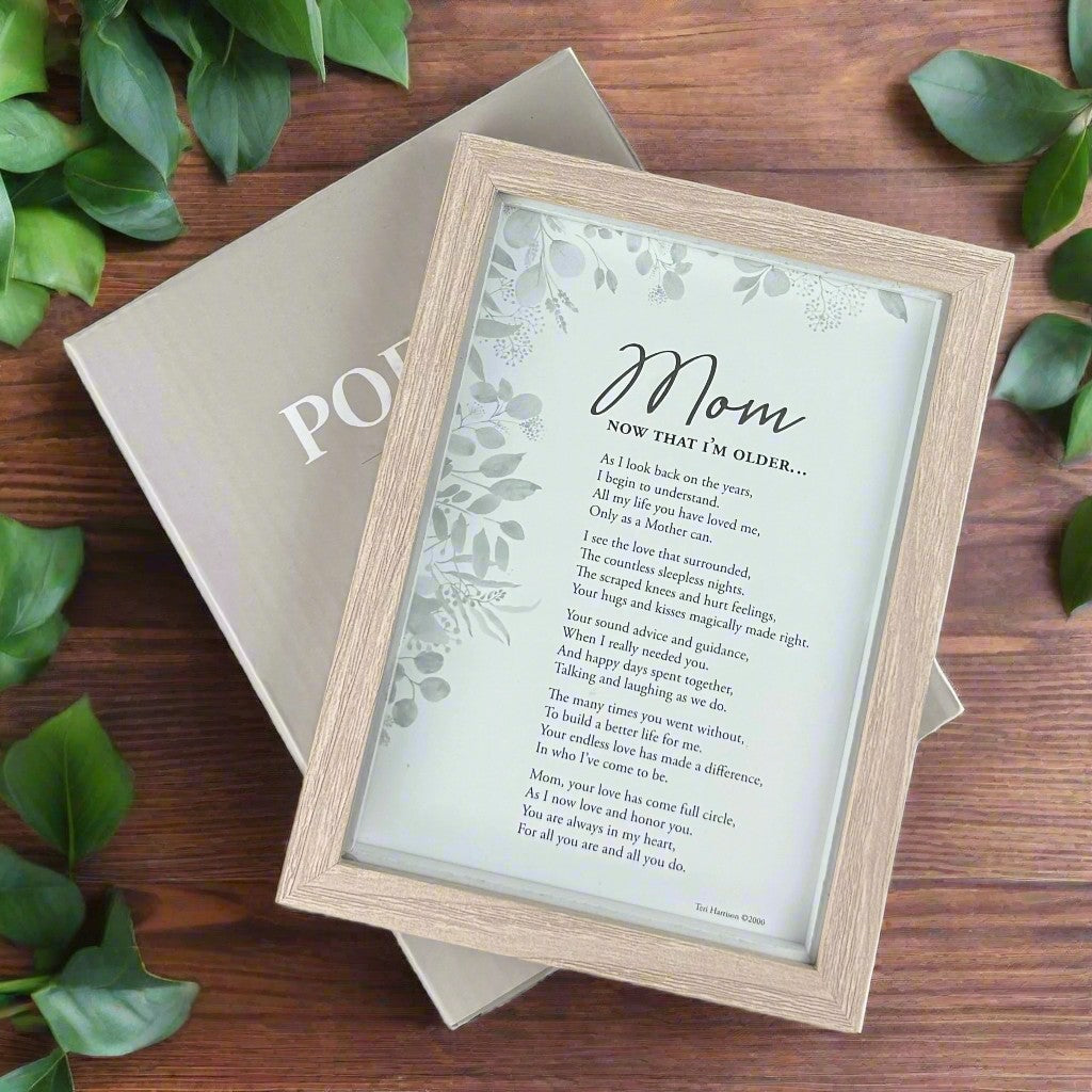 Framed poem for mom, sitting on its box.