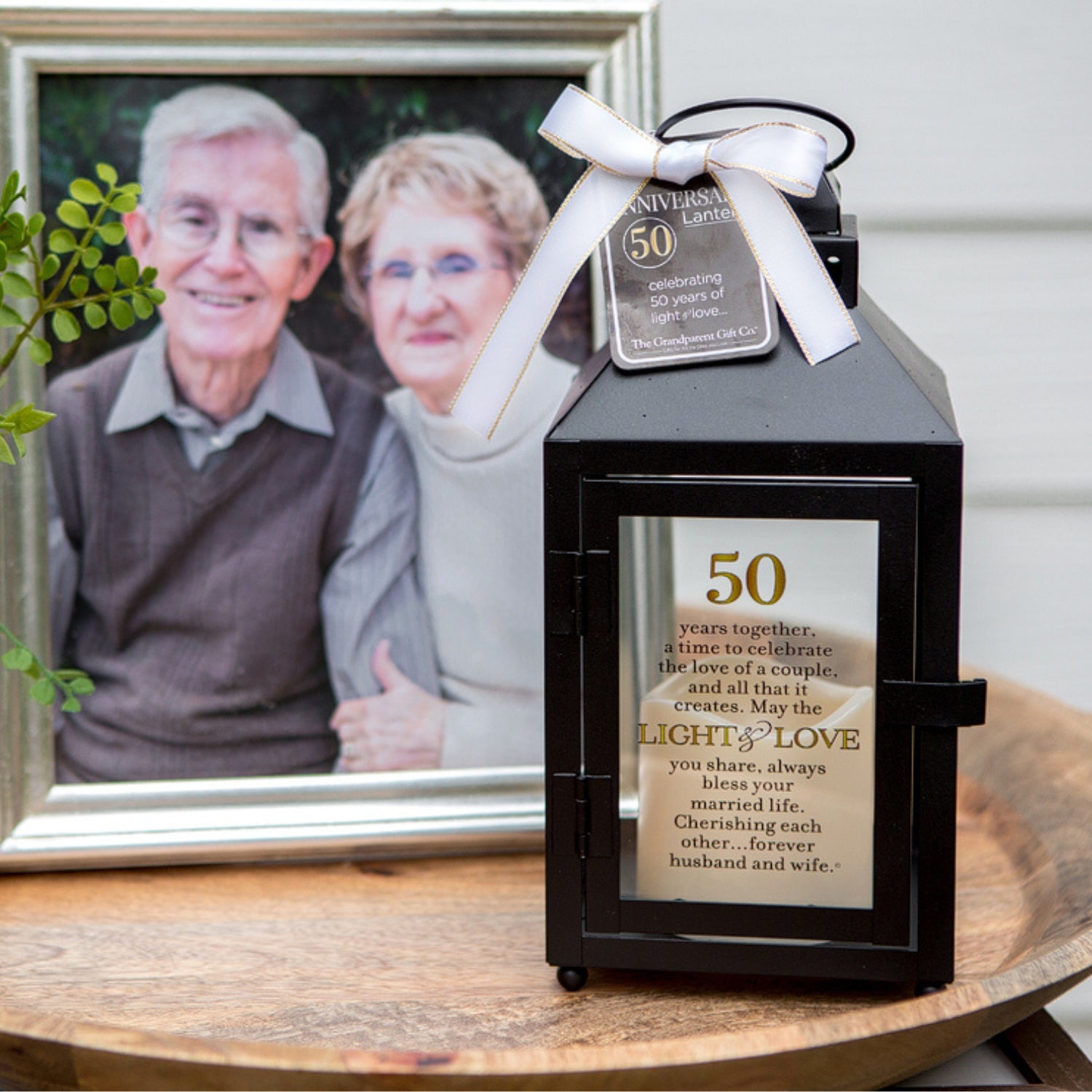 A 50th Anniversary lantern on a table - Click to shop all our gifts