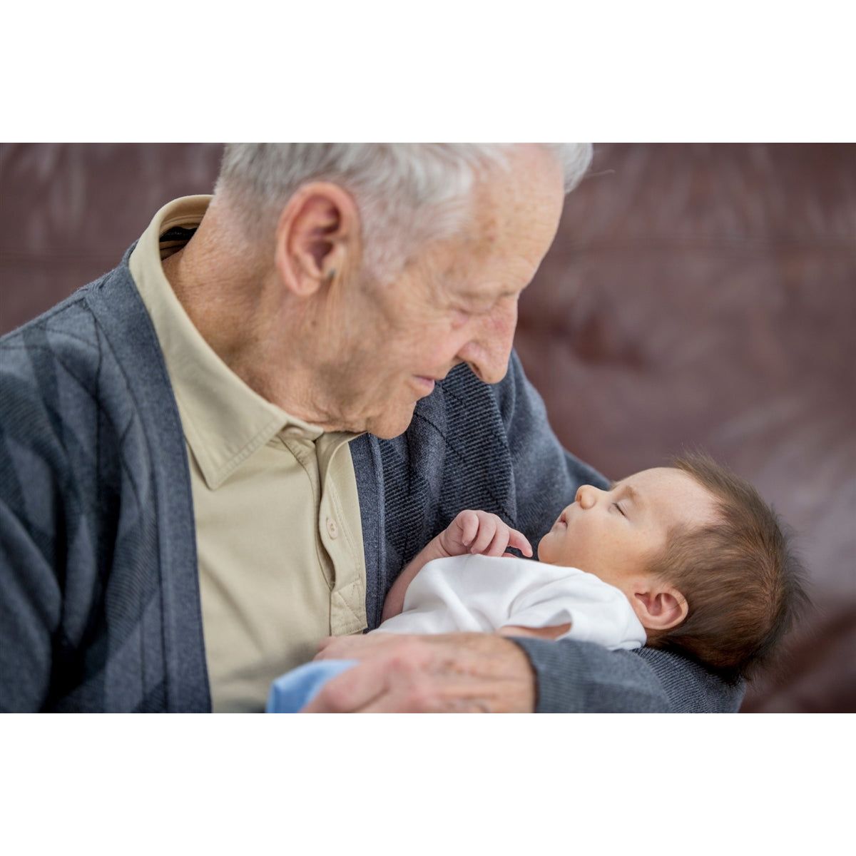 Great-Grandpa holding his great grandson.