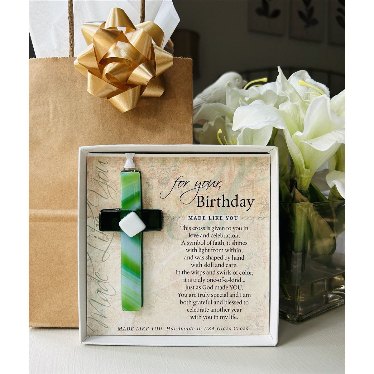 Birthday cross and sentiment in box in front of a gift bag.