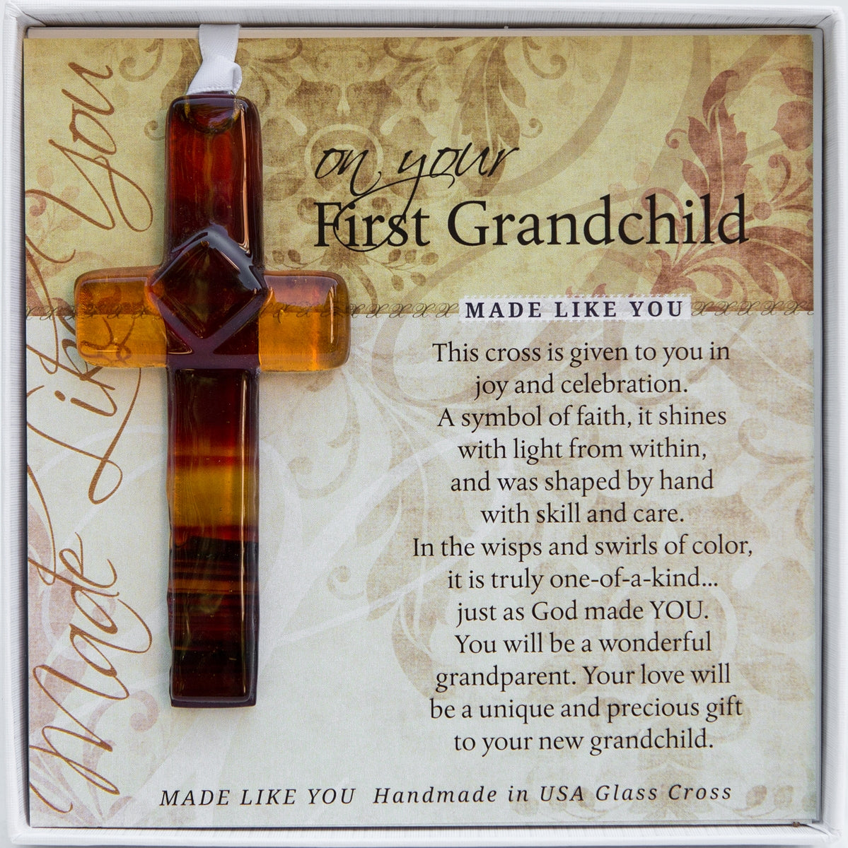 First Grandchild Gift - Handmade 4" amber/brown glass cross and "On Your First Grandchild" sentiment in white box with clear lid.