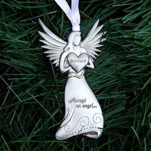 3 of 4:Silver toned metal angel holding a heart with the word 