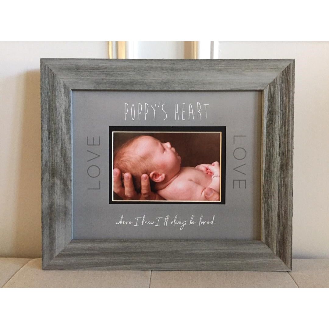 8x10 distressed gray wood frame with gray "Poppy's Heart" artwork, black inner mat, and an opening for a photograph.