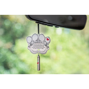 4 of 7:Ornament hanging from rear view mirror.