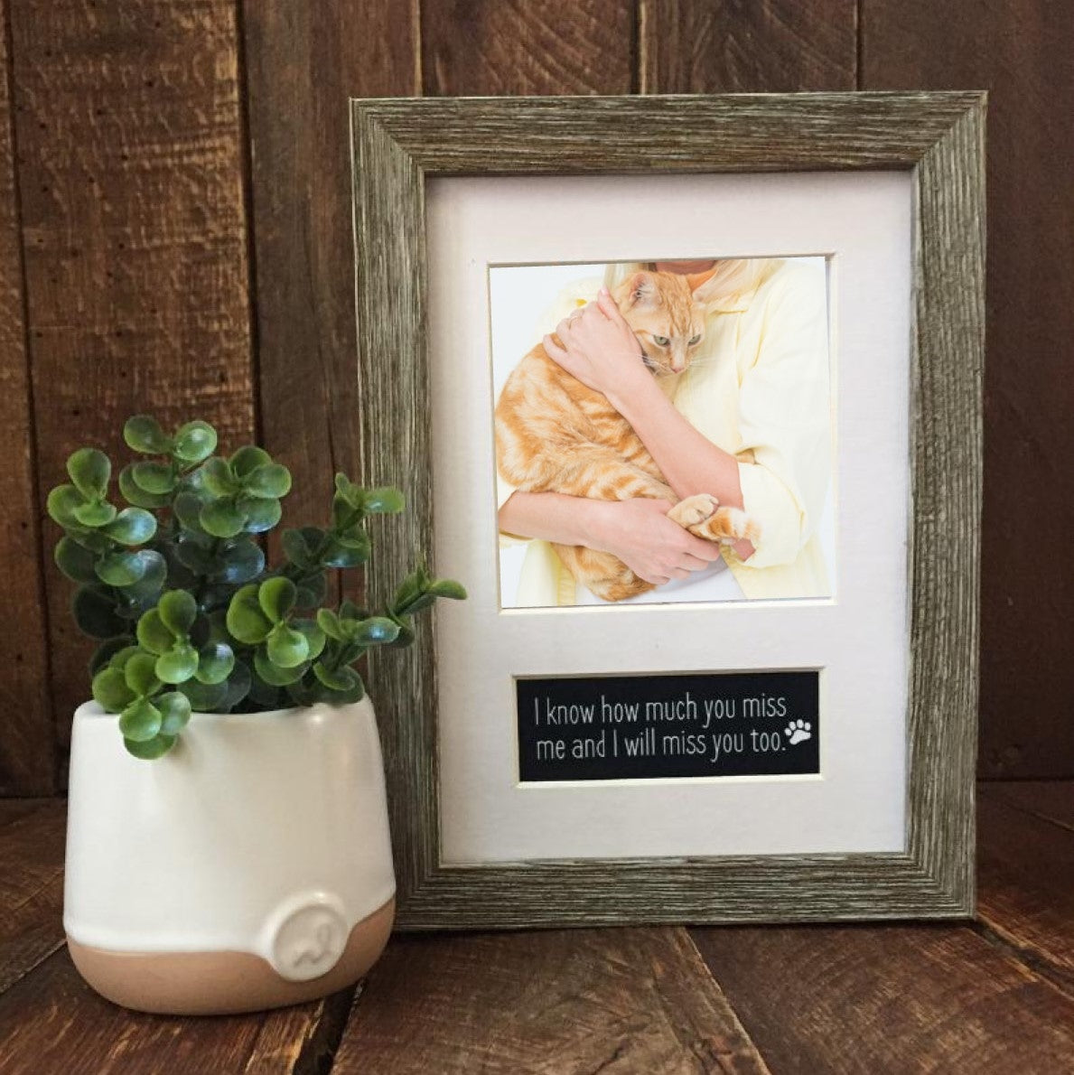 Pet memorial photo frame with a white mat.