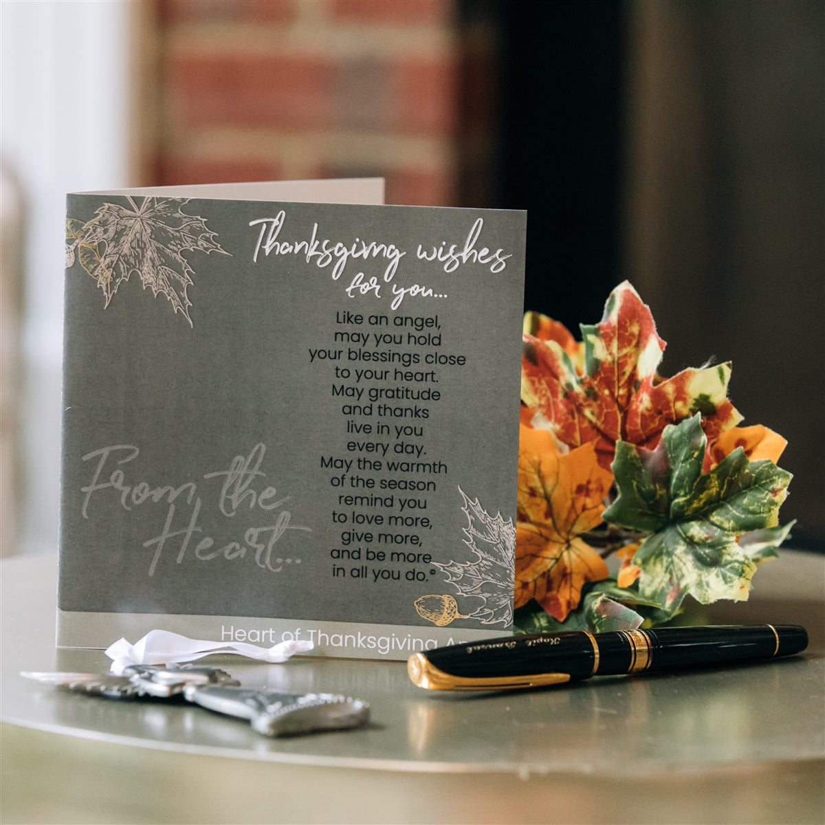 Thanksgiving Wishes card standing open on a table showing the inside where the giver can write a message.