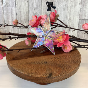 5 of 6:Clear iridescent stained glass star with silver edging with black satin ribbon.