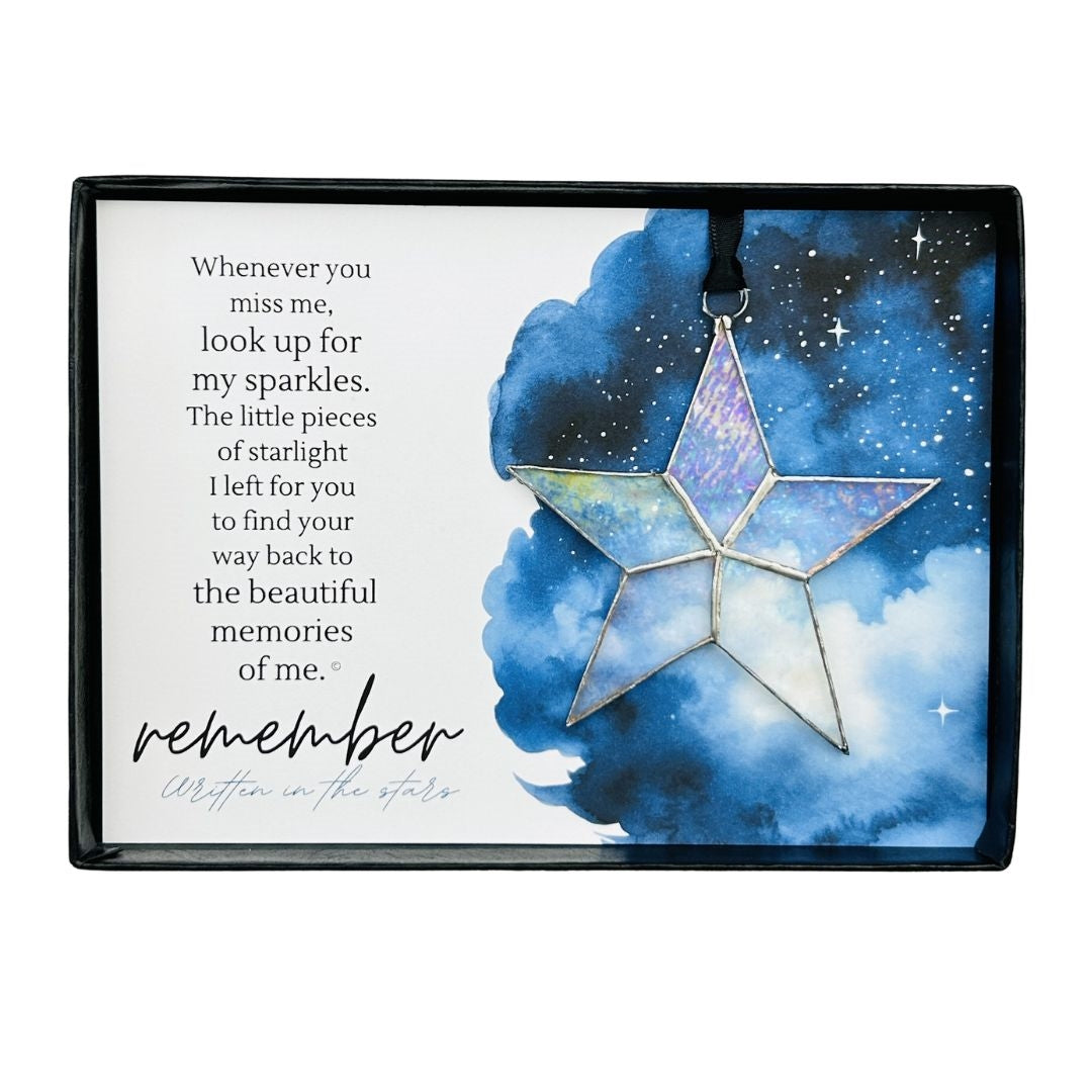 Handmade 4" clear iridescent stained glass star with silver edging, packaged with "Remember" sentiment in black gift box with clear lid.